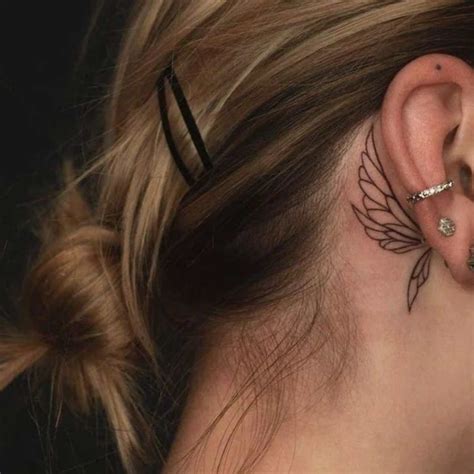 angel behind the ear tattoo|cross behind ear tattoo female.